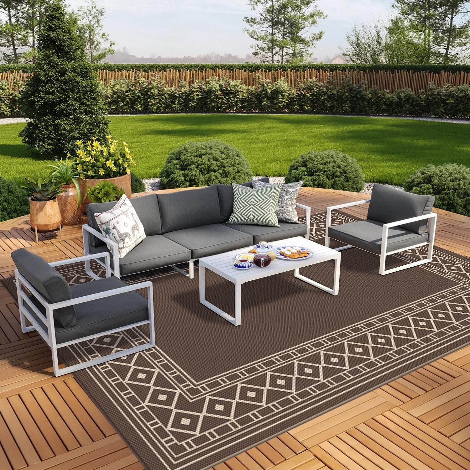 AUCT 21052 - $116 GENIMO Outdoor Rug, Waterproof Plastic Rugs 10'x14' for Camping Coffee